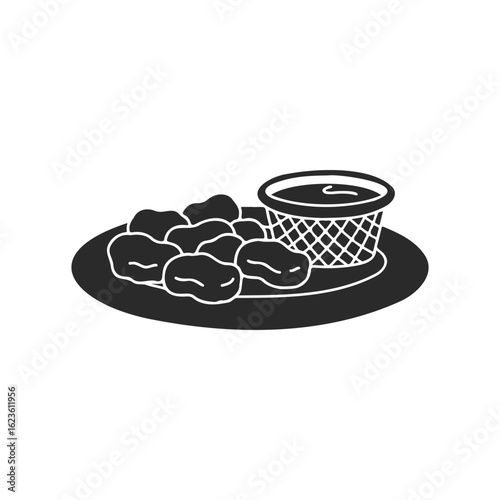 Silhouette of chicken nuggets with dipping sauce on plate