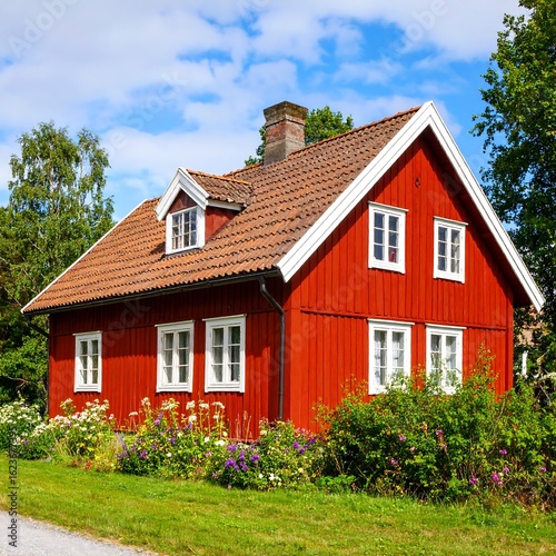 Charming red house, sunny day