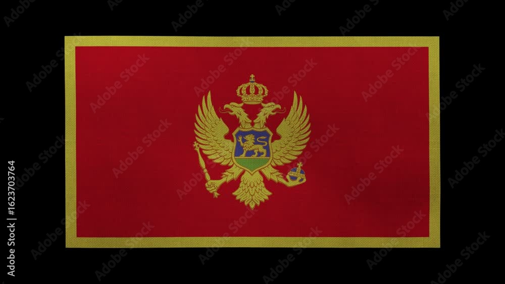 A Montenegro flag rolls and waves in front of a black background.