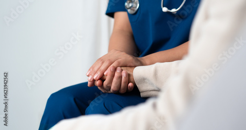 Tableau sur toile Female nurse takes care of patients who come for treatment