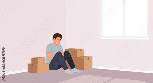 Heartbroken Man Sits Among Boxes In Empty Room After A Difficult Move