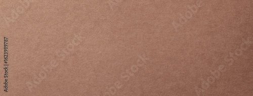 質感のある濃いベージュの紙の背景テクスチャー