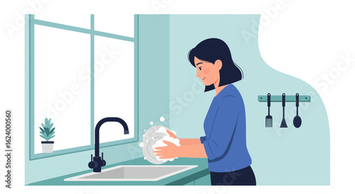Woman Washing Dishes At The Sink In A Modern Minimalist Kitchen