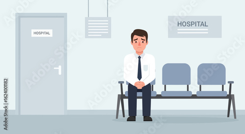 Worried man sitting alone in a hospital waiting room feeling anxious