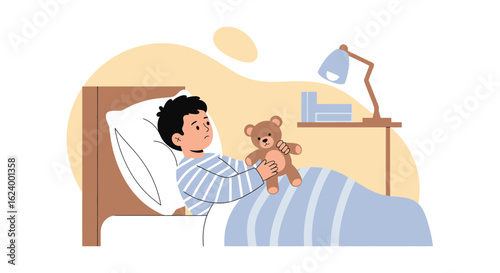 Worried Young Boy Lying Awake In Bed Hugging His Teddy Bear At Night
