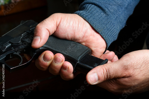 Skilled Gun Enthusiast Preparing for Shooting Session