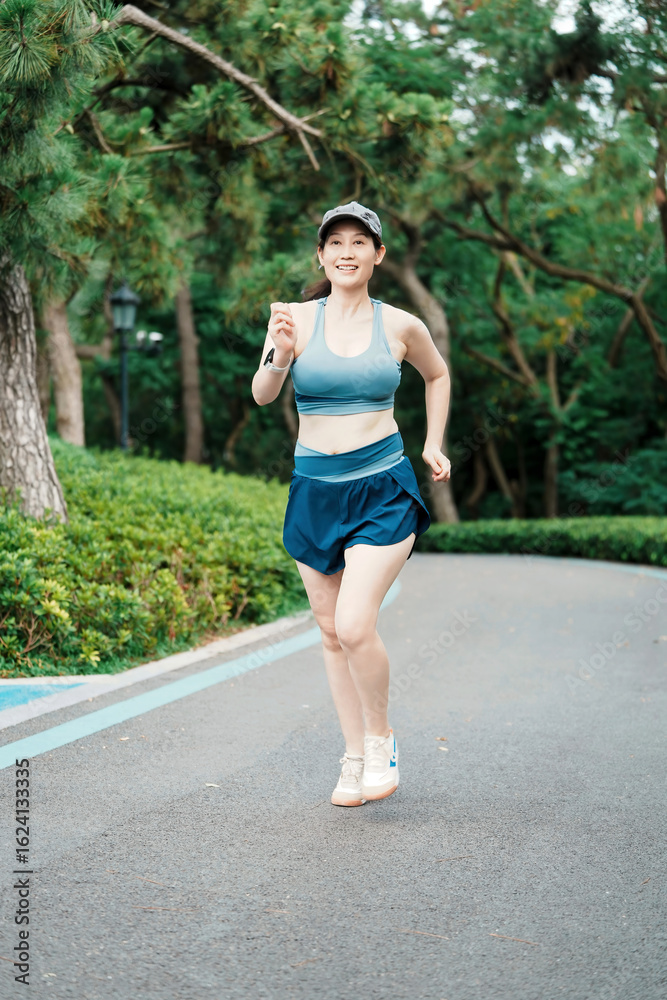 Woman Jogging in Park, Active Lifestyle, Healthy Habits Woman Jogging in Park, Active Lifestyle, Healthy Habits