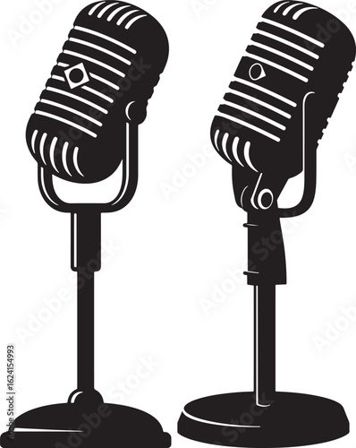 Two vintage microphones on stands silhouette