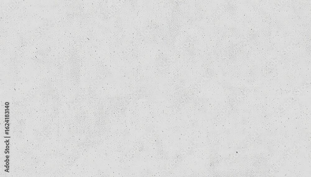 Fototapeta premium Distressed and mottled grey surface with subtle speckles offers a textured background for various design applications