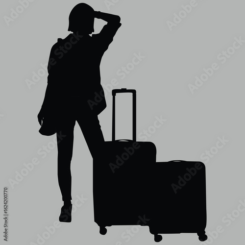 silhouette of a woman with a suitcase