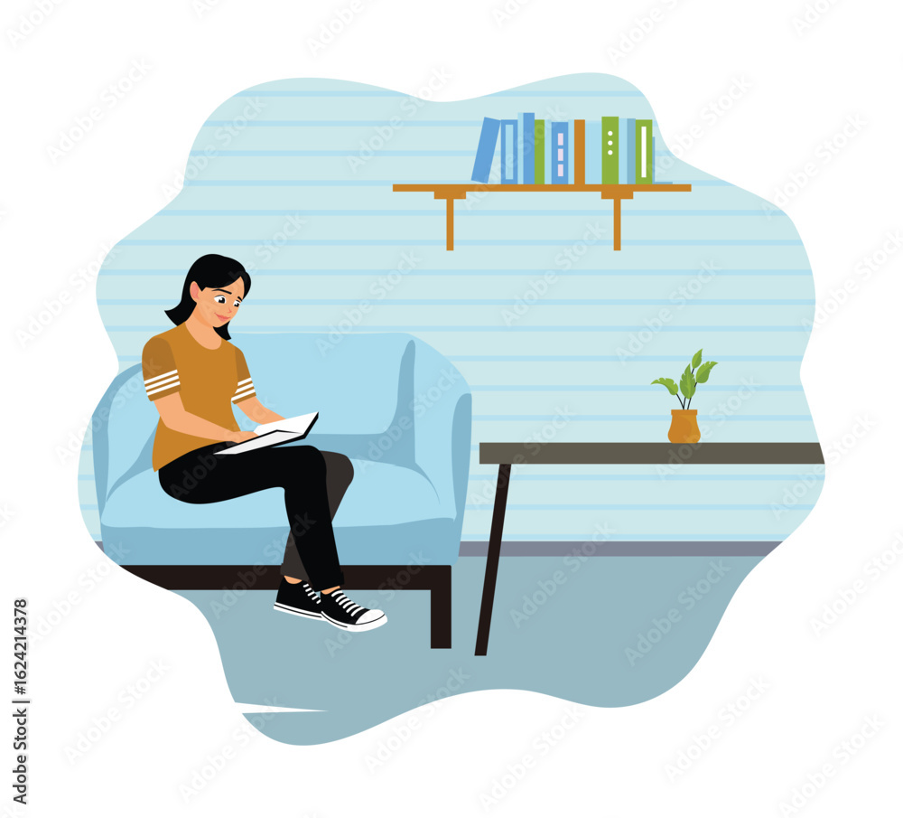 Obraz premium A woman sits relaxed on the sofa and reads a book.