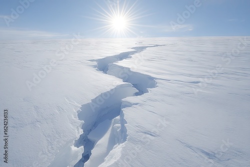 Vast snowy expanse with a deep crack