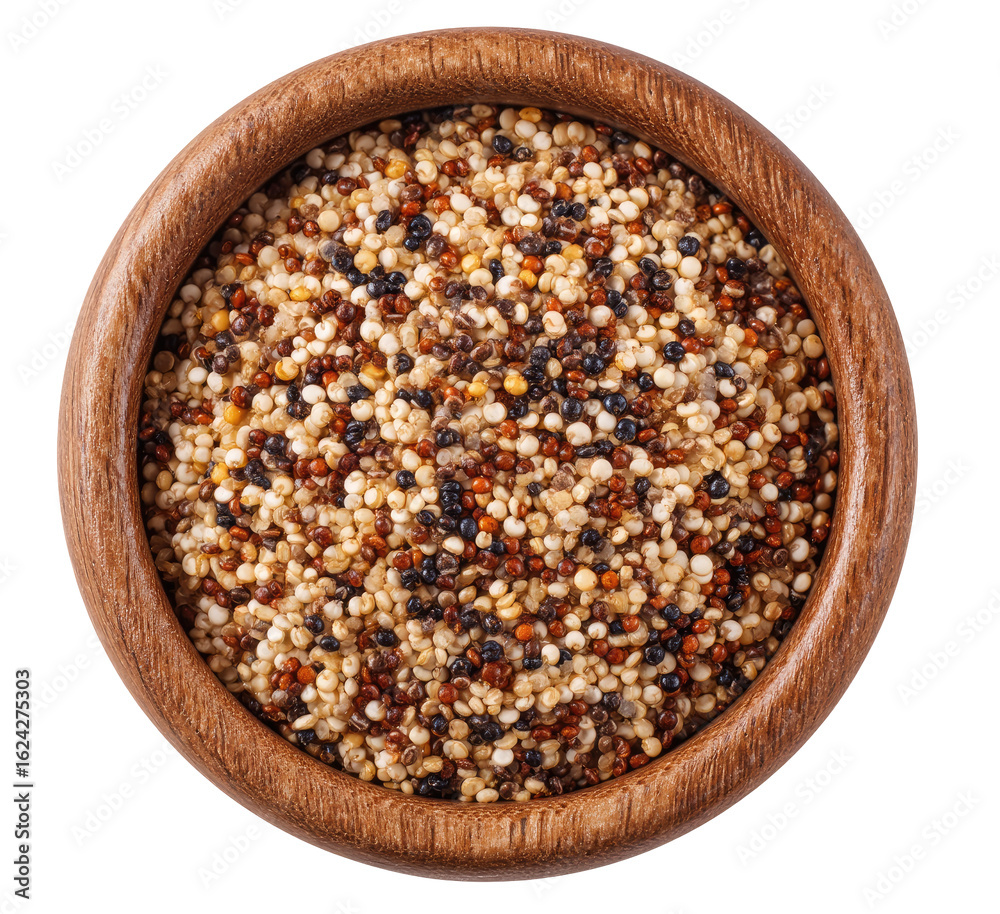Top-down view of a wooden bowl filled with mixed grains. Colorful medley of quinoa, seeds, and possibly other grains. Healthy, nutritious food Top-down view of a wooden bowl filled with mixed grains. Colorful medley of quinoa, seeds, and possibly other grains. Healthy, nutritious food