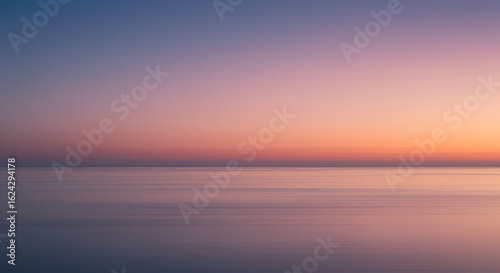 Blurry sunset over a calm sea