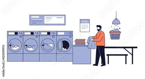 Man folds laundry at laundromat as machines spin in the background for article use