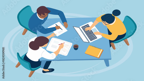 Diverse team collaborating around a table, working on laptop and documents - perfect for websites and presentations.