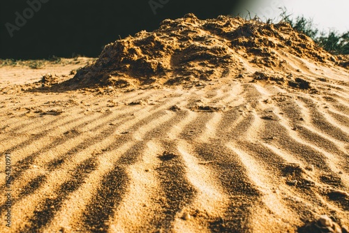 Sandy dune with wind patterns