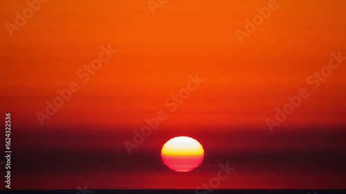 Sunset Serene Orange Sky with Dramatic Twilight and Sun Setting Over Horizon – Peaceful Minimalist Landscape 4K HD Video Footage Download, Atmospheric Vibrant Nature