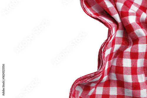 Red and white checkered tablecloth draped on black background