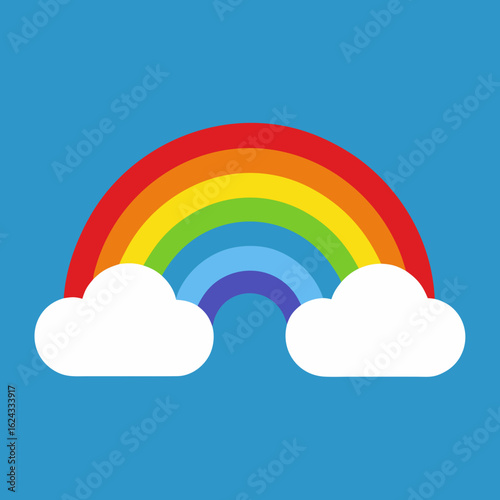 Colorful rainbow arch with fluffy clouds on a blue sky