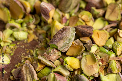 pistachios chopped into pieces, crispy pistachios fried with salt, closeup