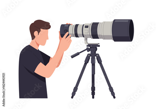 Person adjusting camera lens on tripod