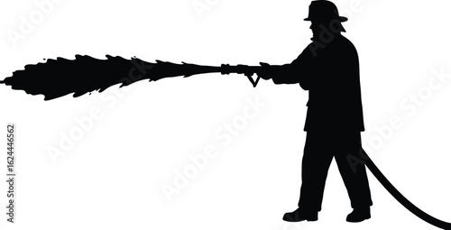 Firefighter silhouette spraying water