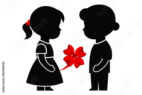 Little girl giving a red bow to a little boy in silhouette