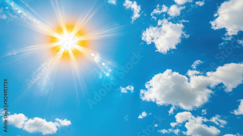 Bright Sunlight Shining Through Clouds in Clear Blue Sky