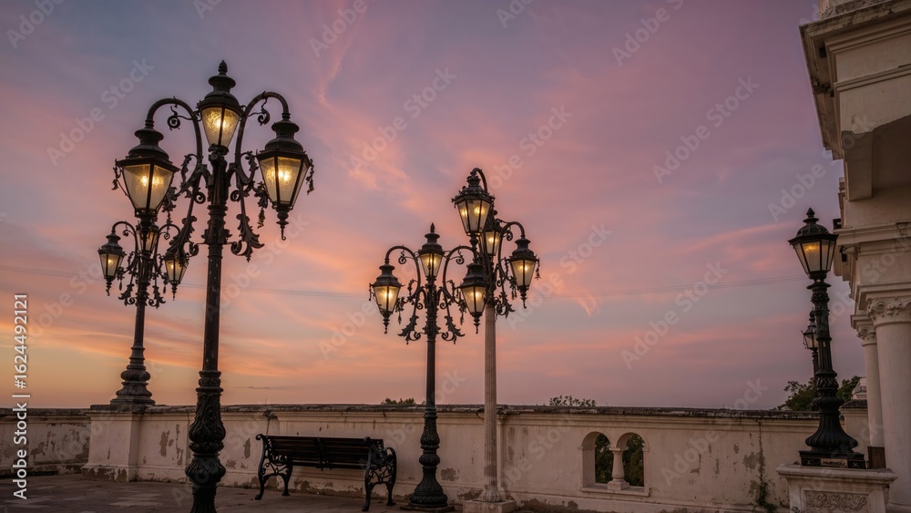 Obraz premium Classic lamp posts against dusk backdrop