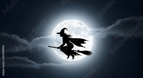 Silhouette of a witch flying on a broomstick against a bright full moon background
