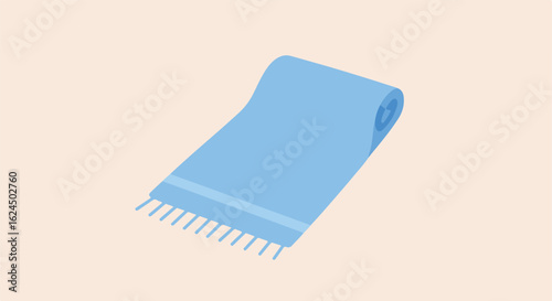Rolled blue bath towel isolated against a plain background for hygiene concepts