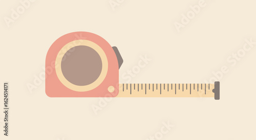 Tape measure extending, flat lay, on a plain surface. Useful for home improvement