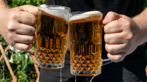 Cheers with frothy amber beer mugs, embodying Oktoberfest zeal and International Beer Day camaraderie, dripping with golden effervescence
