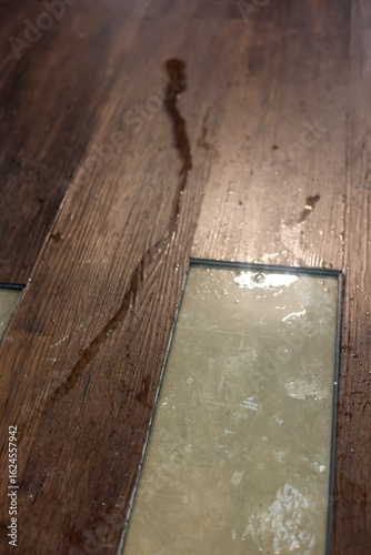 Slab Leak Water Damage Under Laminate Flooring