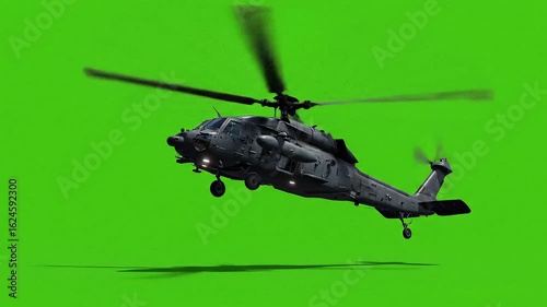 Flying Helicopter with Spinning Rotor Blades on Green Screen Background