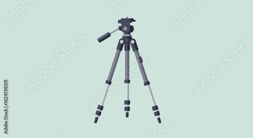 Camera tripod on a plain background, suitable for photography & videography projects