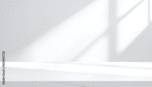 Sunlit Window Shadows Cascading on a White Wall and Marble Table