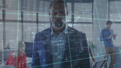 Light-blue grid floating across office, manager stepping while lines tracing face showing network