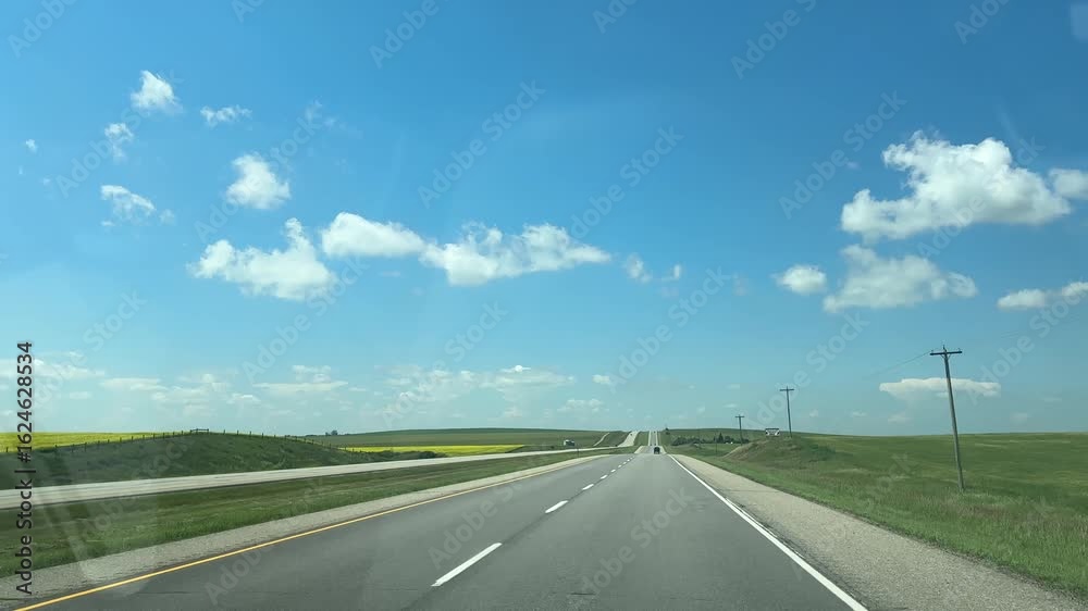 Driving on Alberta Freeway During Summer Afternoon Driving on Alberta Freeway During Summer Afternoon