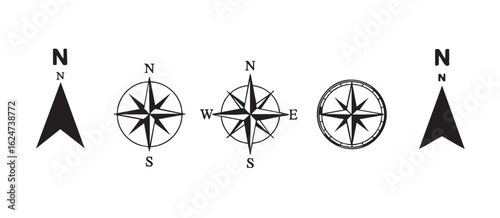 Five black and white minimalist compass rose and north arrow icons direction navigation