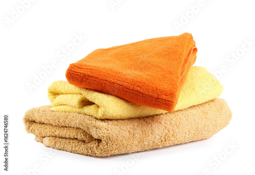 Stack of soft towels isolated on white