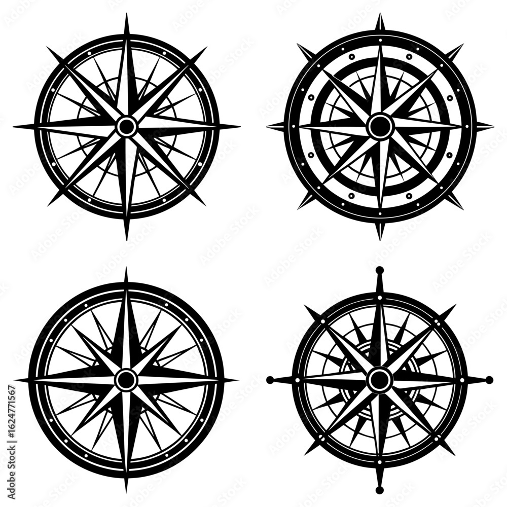 Fototapeta premium Collection of four black and white compass rose designs with varying styles and circular borders shown