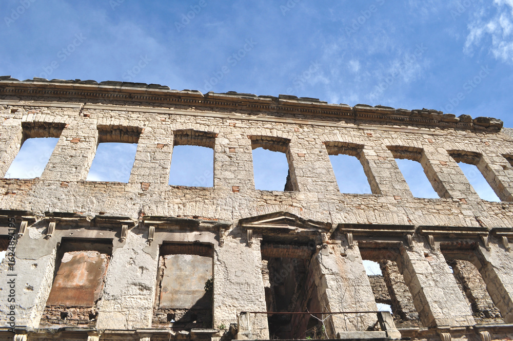 Obraz premium Ruins of buildings from the Bosnian war in Mostar. Balkans travel idea concept.