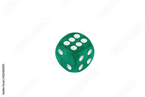 Close-up of a single genuine used green colored semi-transparent dice