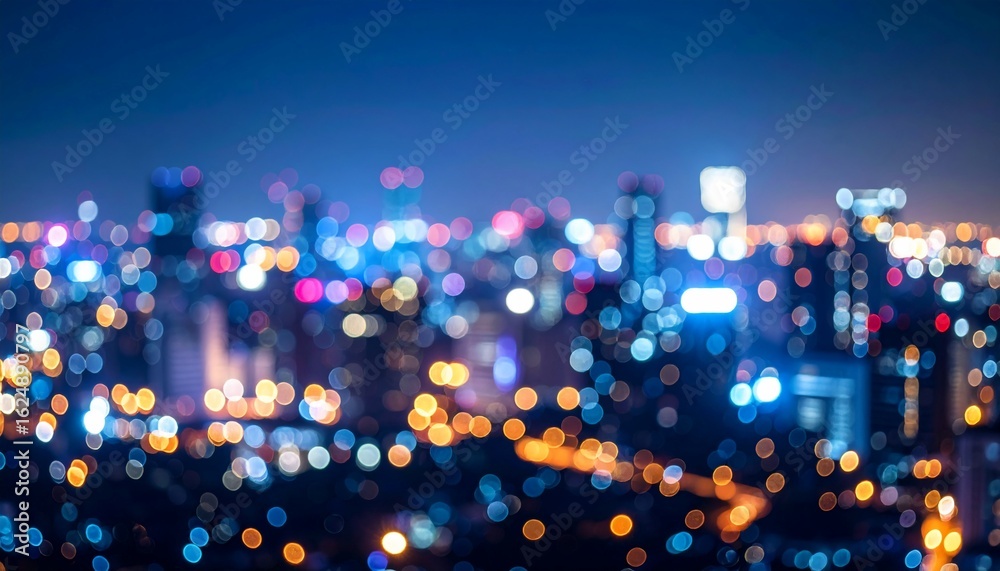 Fototapeta premium Blurred skyline at night, city lights glowing