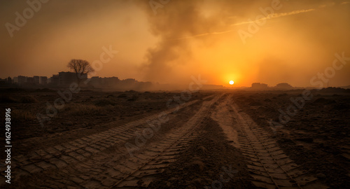 sunset over the war battlefield field
