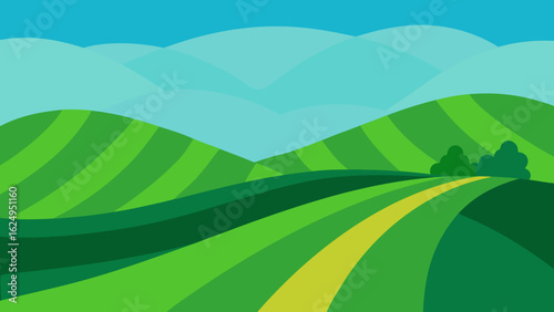 Green Field Transitioning into Gentle Hills Scenic Countryside Landscape