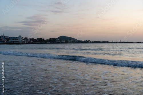 The sunset view of the beautiful beach on Jeju Island