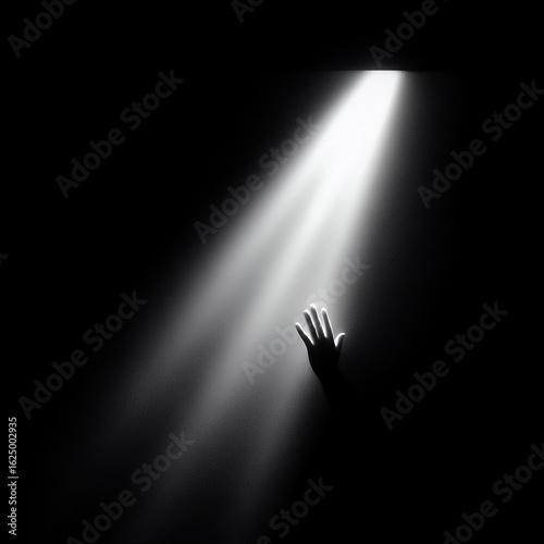 dramatic light beam with reaching hand silhouette dark background spiritual hope beam